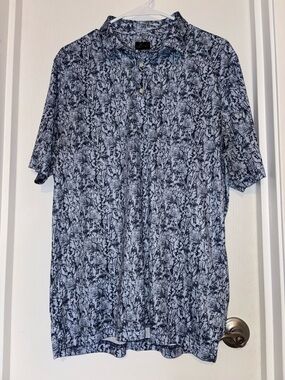 Greg Norman Collection Short-Sleeve Polo in Blue and White Abstract Print